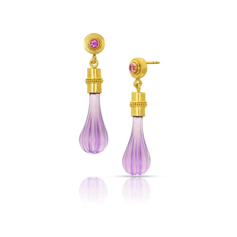 Delicate hand carved matte amethyst "club" shaped drops are a feature of these dainty earrings. Capped with warm gold and velvety granulation, they swing gently from sparkling bezel set hot pink spinel. Post and Guardian back.

Made from recycled 22k gold, hand carved Brazilian amethyst and Burmese spinel (.14ctw). Length approximately 35 mm or 1.38 in.
