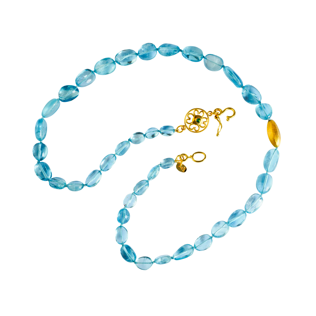 Santa Maria aquamarine is the most coveted of all the aquamarine hues - it has an unrivalled intensity of color. A single brushed gold Mesopotamian style hollow bead is a perfect foil, sand and sea. An intricate Roman style filigree decorated clasp, gem
set on each side, completes the necklace. Length 19 inches. 

Made from recycled 22k gold, unheated Brazilian Santa Maria aquamarine (126.53ctw), Brazilian Paraiba tourmaline (.05ctw) and Burmese pink spinel ((,07ctw). One-of-a-kind.
