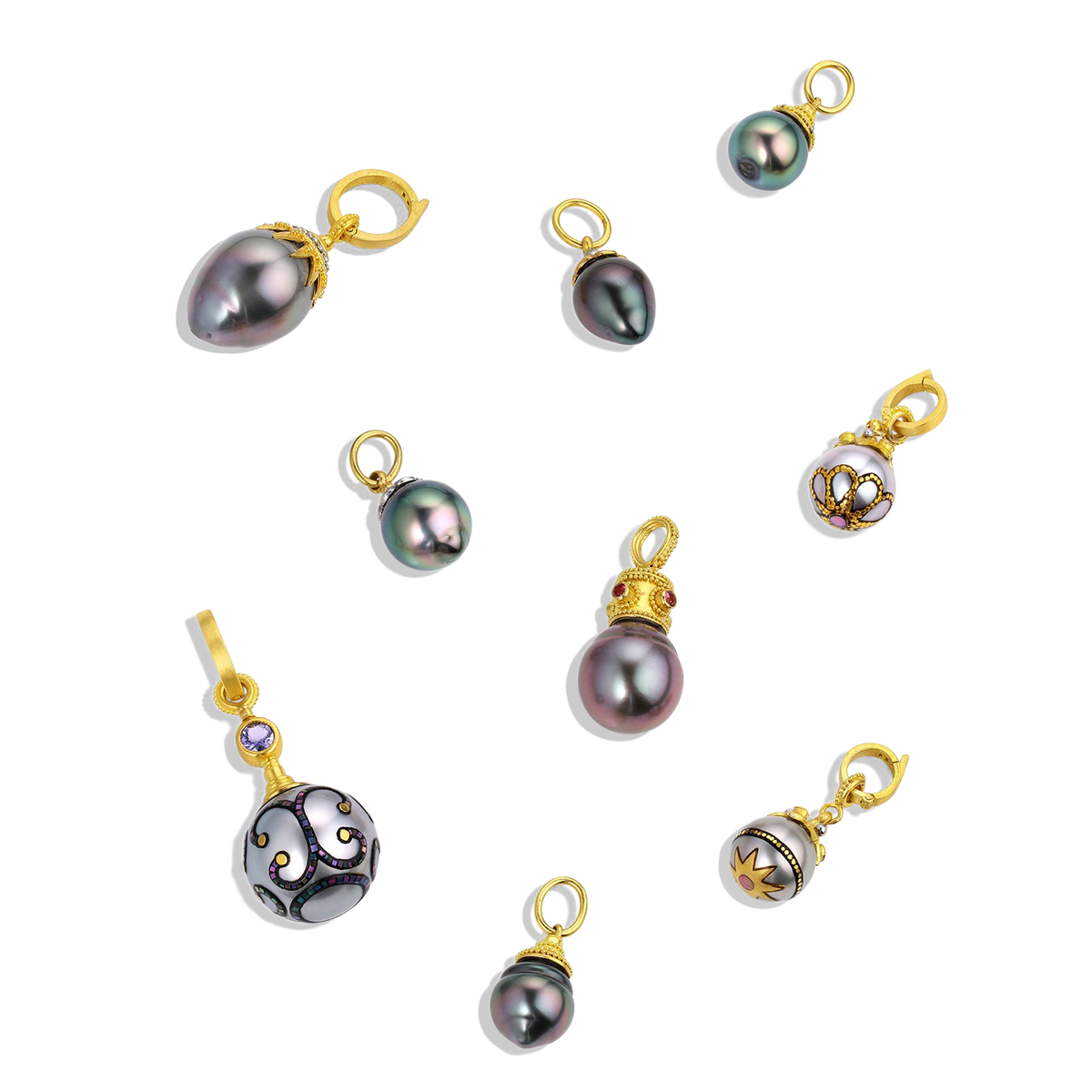 The Maki-e pearl charm with Anthill garnets (middle row, on the right) shown with other Maki-e and Tahitian pearl charms.