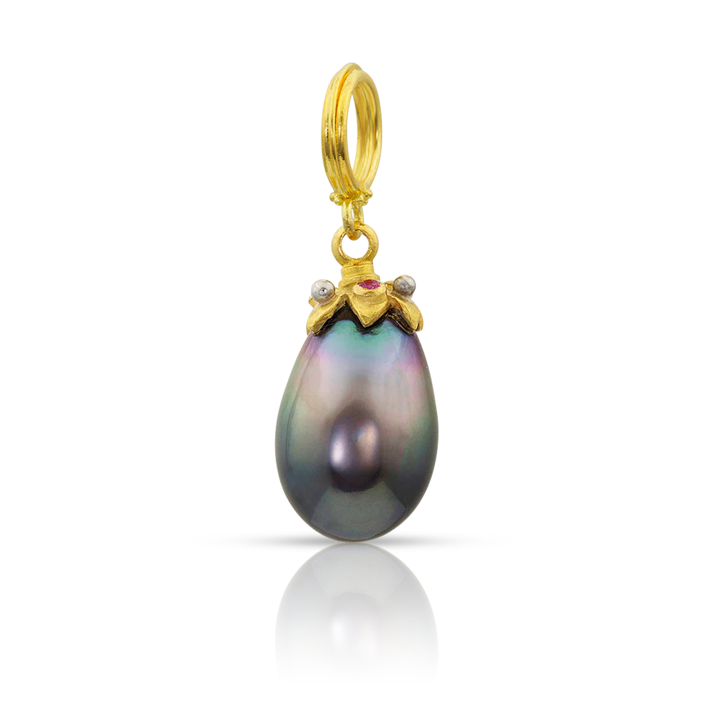 Beautiful, glossy semi–Baroque eggplant shaped Tahitian pearl with purple and brown tones. Topped by star caps in buttery 22k gold, with oversize platinum granules and deep pink spinels.

Handmade using recycled metals, Burmese spinel and cultured Tahitian pearls. Length approximately 27mm, width 10mm (L 1.1in W .4in).
One-of-a-kind.