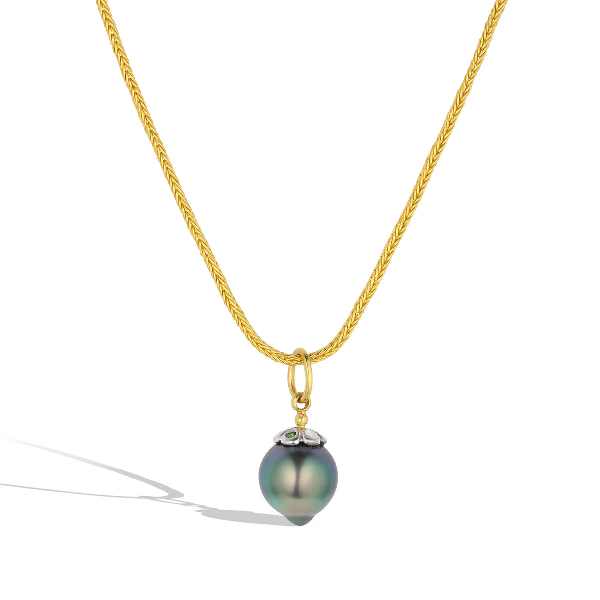 The Blue Pearl charm shown on a handwoven gold chain. The chain is available separately.