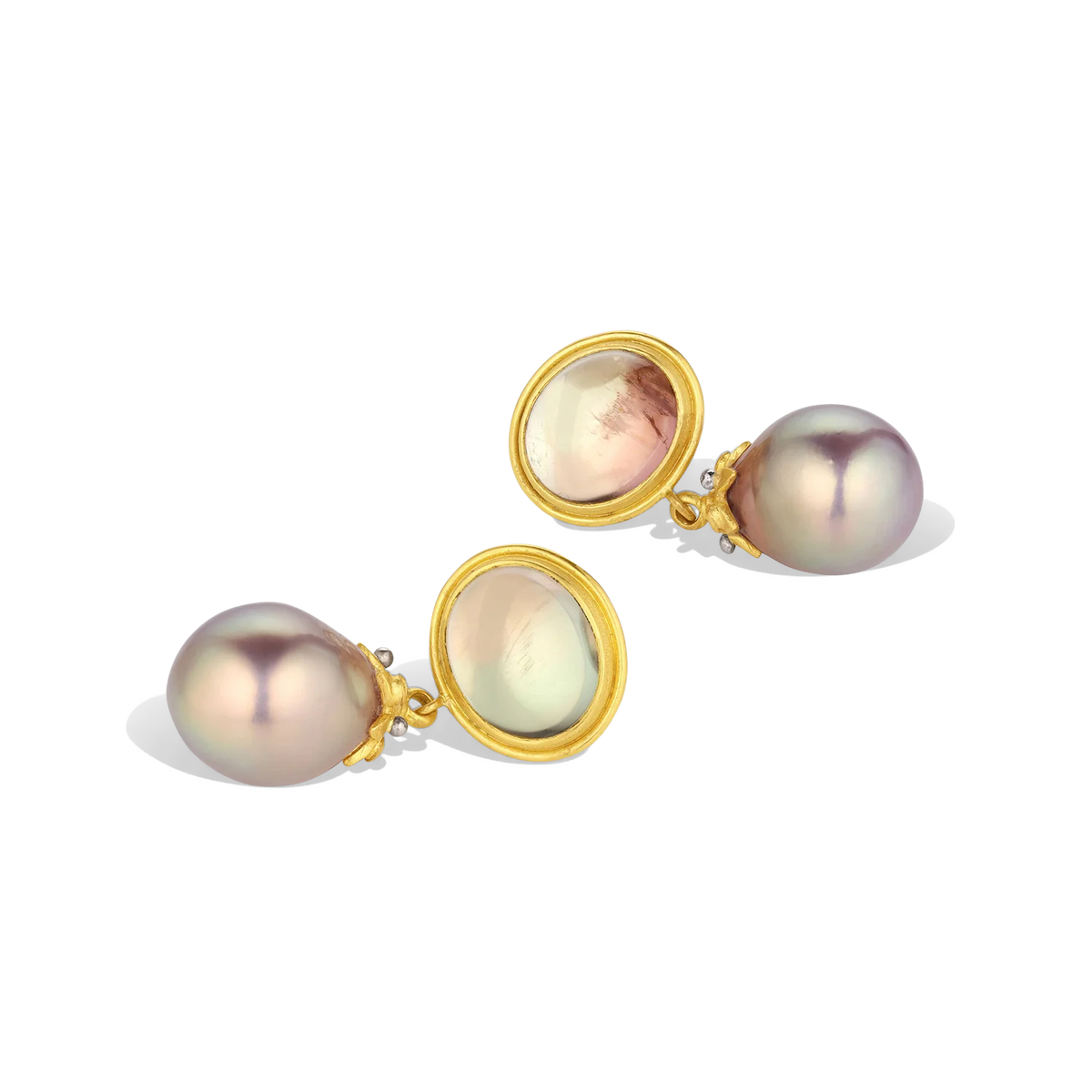 Rich metallic bronze pearls with pistachio undertones have diamond set platinum granulated gold caps and soft bi-color green/gold and rust tourmaline cabochons (10.8ct). Set in rich, warm high karat gold, a discreet diamond sparkle makes these drops an unusual and spectacular choice. Length approximately 32.5mm W 14.8mm (L 1.3in W .6in).

Made from recycled 22k yellow gold and platinum, Canadian diamonds (VS G, .09ct), Nigerian bi-color tourmaline (10.8ct) and 11.9x13.9mm freshwater pearls.