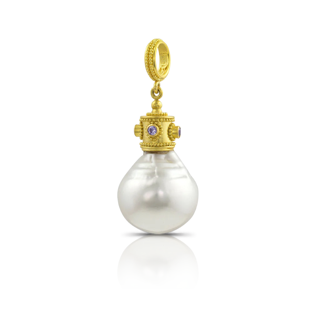 We were fortunate to be able to acquire a selection of beautiful circlé and baroque South Sea pearls from Australia and they're perfect for charms. This lovely baroque cried out for a bejeweled and granulated Byzantine style crown, which is set with sparkling lavender spinel to compliments it luster.

Please note that the chain is available separately.

One-of-a-kind.