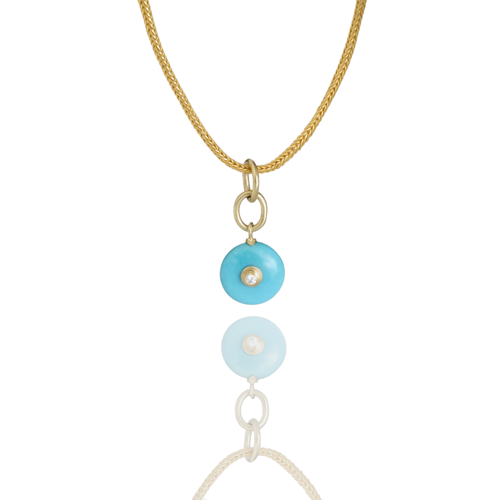 Cerula Charm #1 on a chain.