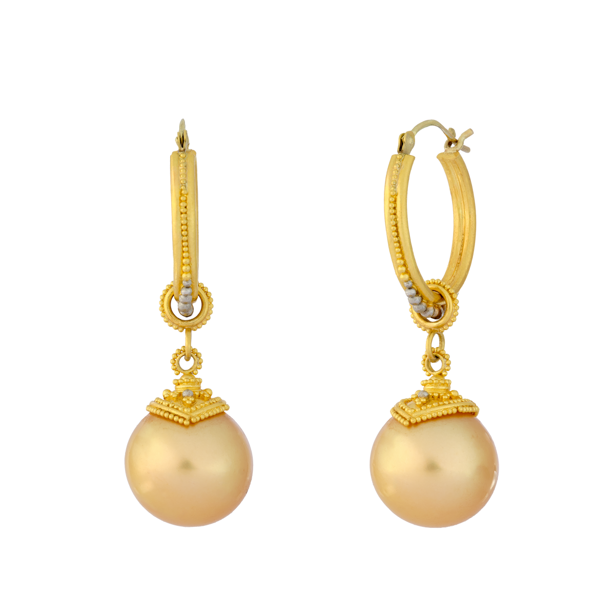 Slip on a charm, here is a pair of our gold pearl charms.