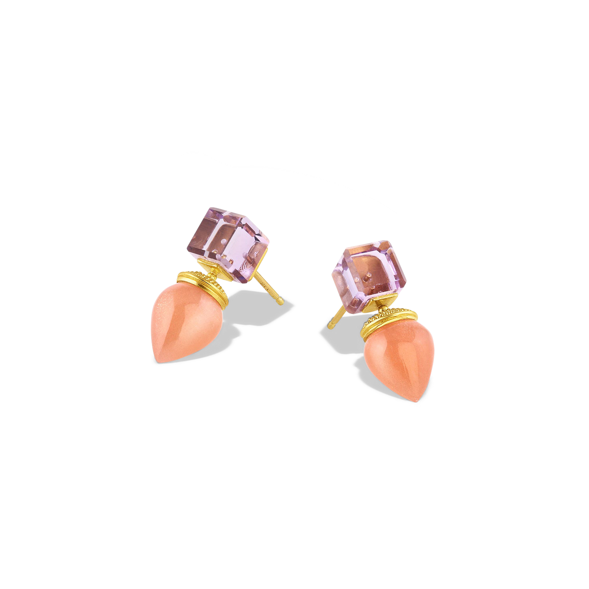 Custom cut violet hued amethyst cubes provide the perfect foil to the soft sheen on peach moonstone drops. Although ancient in technique, the soft volume of the granulation on the moonstone caps gives both an antique and very present look, blending harmoniously with the sharp, modern angles of the gemstone cubes. Length approximately 22mm 9.2mm (.8in W .4in).

Made in recycled 22k yellow gold, amethyst (8.71ct) and Indian peach moonstone (11.03ct).

One-of-a-kind.