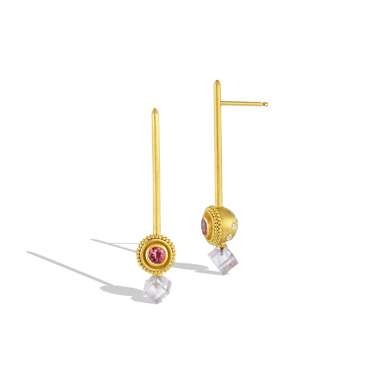 These clear grey tourmaline cubes, set below golden spheres edged with a ruff of granulation and set with pink spinel and diamonds, have just the right amount of softness and sparkle. Long, brushed golden sticks allow the spheres and cubes to swing gently from the ear, giving a "barely there" feeling, the diamonds discreetly twinkling. Length approximately 43.6mm W 8.8mm (L1.7in W .35in). Made with recycled 22k yellow gold, tourmaline (2.68ctw), Canadian diamonds (VS, F-G .36ctw) and spinel (.55ctw). 