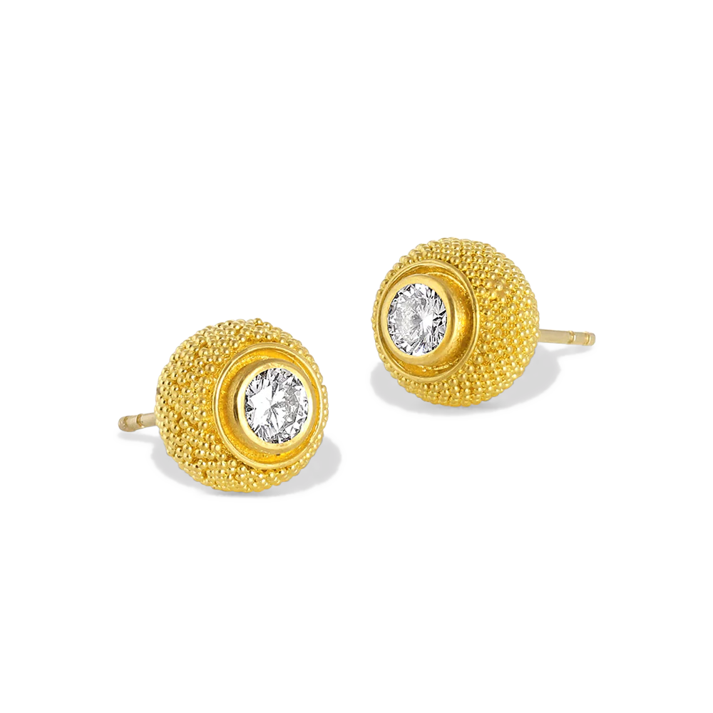 Elegant yet versatile cushion style stud earrings feature delicate all over granulation highlighted by a discreet diamond sparkle, giving a timeless yet contemporary look. The rich, warm tone of the gold and texture of the granulation give the appearance of the pile on a velvet cushion. L 9mm W 8mm (L .35in W .32in) Made in recycled 22k yellow gold and antique diamonds (.5ctw). Other gemstone options are available, contact us to discuss.

These were featured in Artistar Jewels 2022 Exhibition in Milan.