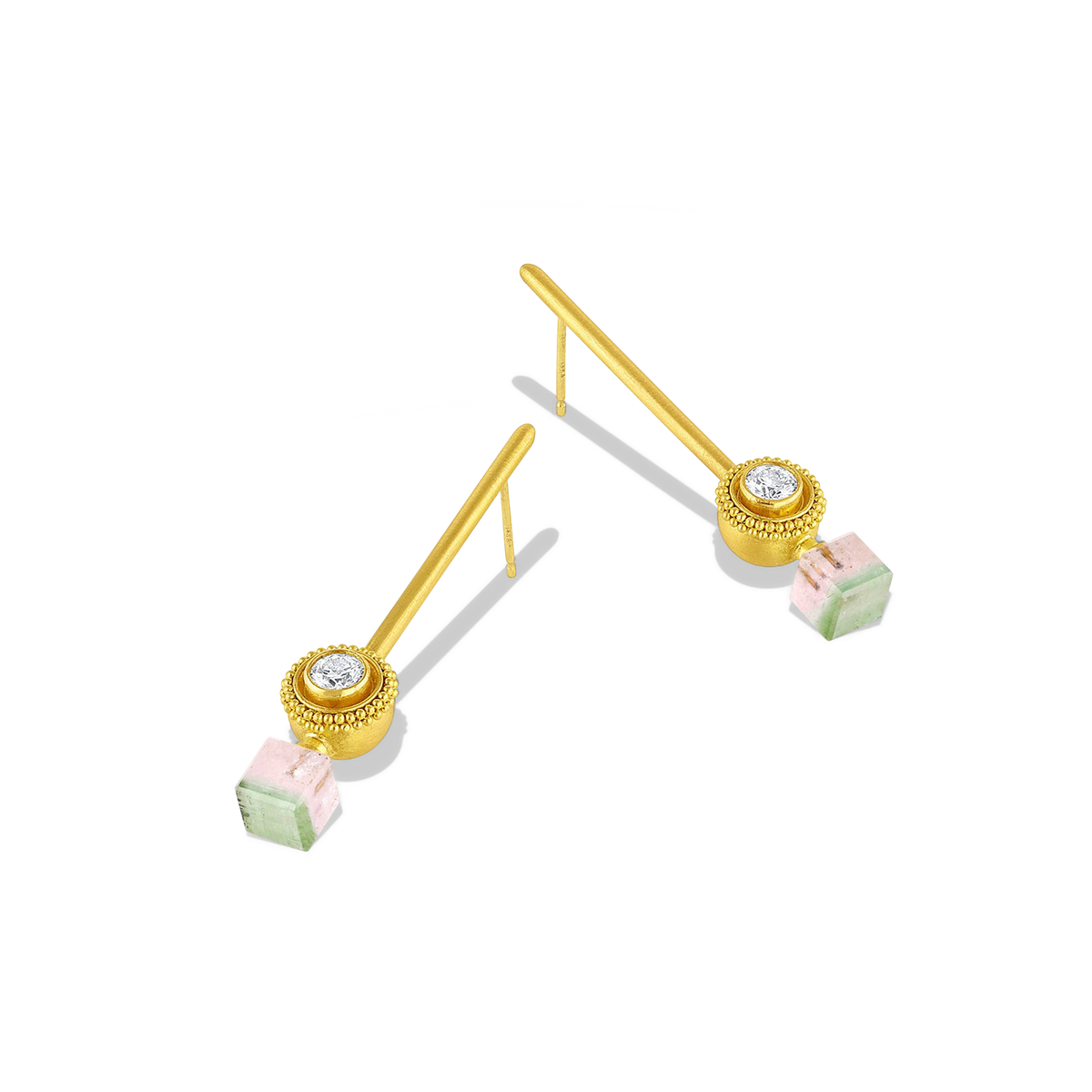 Golden globes delicately edged with a ruff of granulation and set with sparkling diamonds are the perfect foil for a pair of unusual soft mint green and the palest pastel pink tourmaline cubes. Long, elegant brushed golden wands allow the spheres and cubes to swing gently from the ear, making these earrings unique and striking. One-of-a-kind. Length approximately 43.3mm W 8.6mm (L 1.7in W .34in).

Made with recycled 22k yellow gold, bi color tourmaline (5.02ctw) and reclaimed diamonds (VS, G, .50ctw).