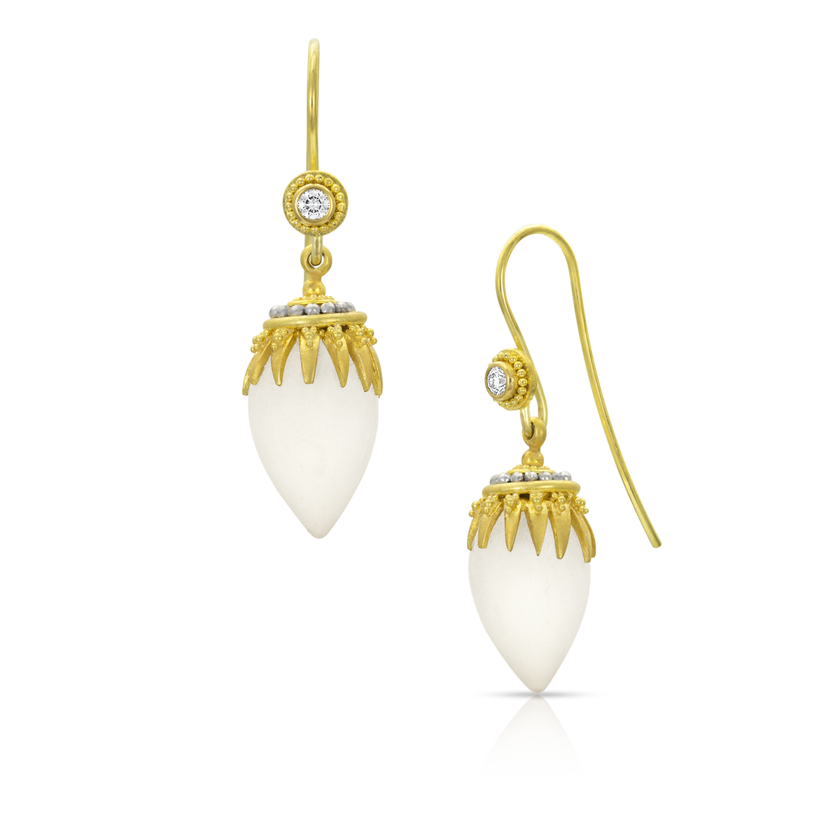 Hand carved tear shaped matte crystal drops are set with beautiful "spider" style granulated caps that swing from sparkling diamond set French hook ear wires. Full of movement, these earrings display a tableau of minute granules in gold and polished platinum inspired by the craft and metalwork of the ancient Etruscans, whose granulated jewelry featured ornate and complex patterns and scenes. Made from 18k and 22k yellow gold, platinum, 19.5ct rock crystal, .11ct Canadian diamonds (VS, F-G).  Made to order.