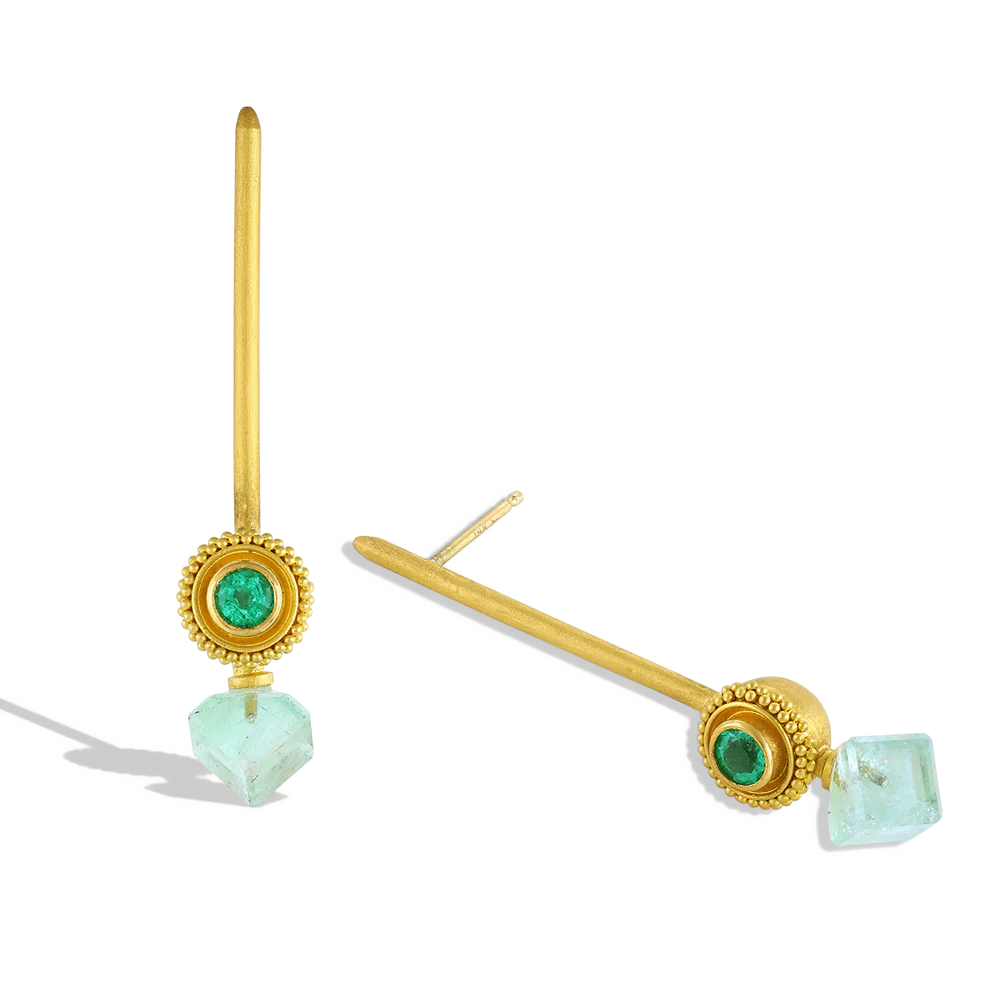Golden spheres delicately edged with a ruff of gold granulation, set with Zambian emeralds - the perfect foil for soft green tourmaline cubes, offset for a fresh, modern look. Long, elegant brushed golden sticks allow the spheres and cubes to swing gently from the ear, making these earrings unique and striking. Length approximately 44.8mm W 8.9mm (L 1.7in W .4in).

Made with recycled 22k yellow gold, Zambian emeralds (.55ctw) and Brazilian tourmaline (6.15ctw).

One-of-a-kind.