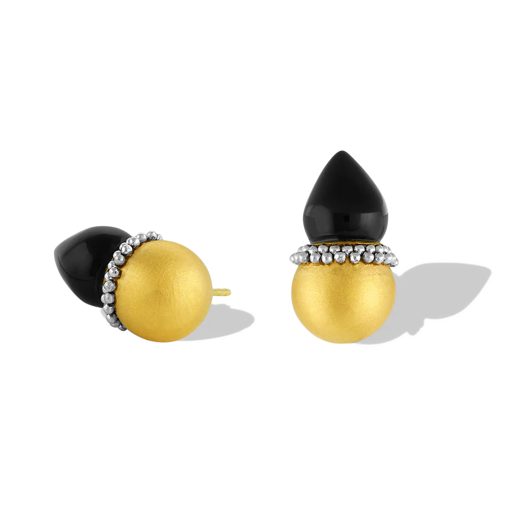 Golden spheres are edged with a ruff of platinum granules and set with polished black onyx flame pointed drops. As the spheres are hollow, they are light and comfortable to wear. These uniquely shaped and versatile earrings can be worn as ear climbers or as a stud, simply turn the onyx point downwards. Length approximately 19.9mm W 11.1mm (L .8in W .4in).

Made in recycled 22k yellow gold and platinum and black onyx (10.49ct).
