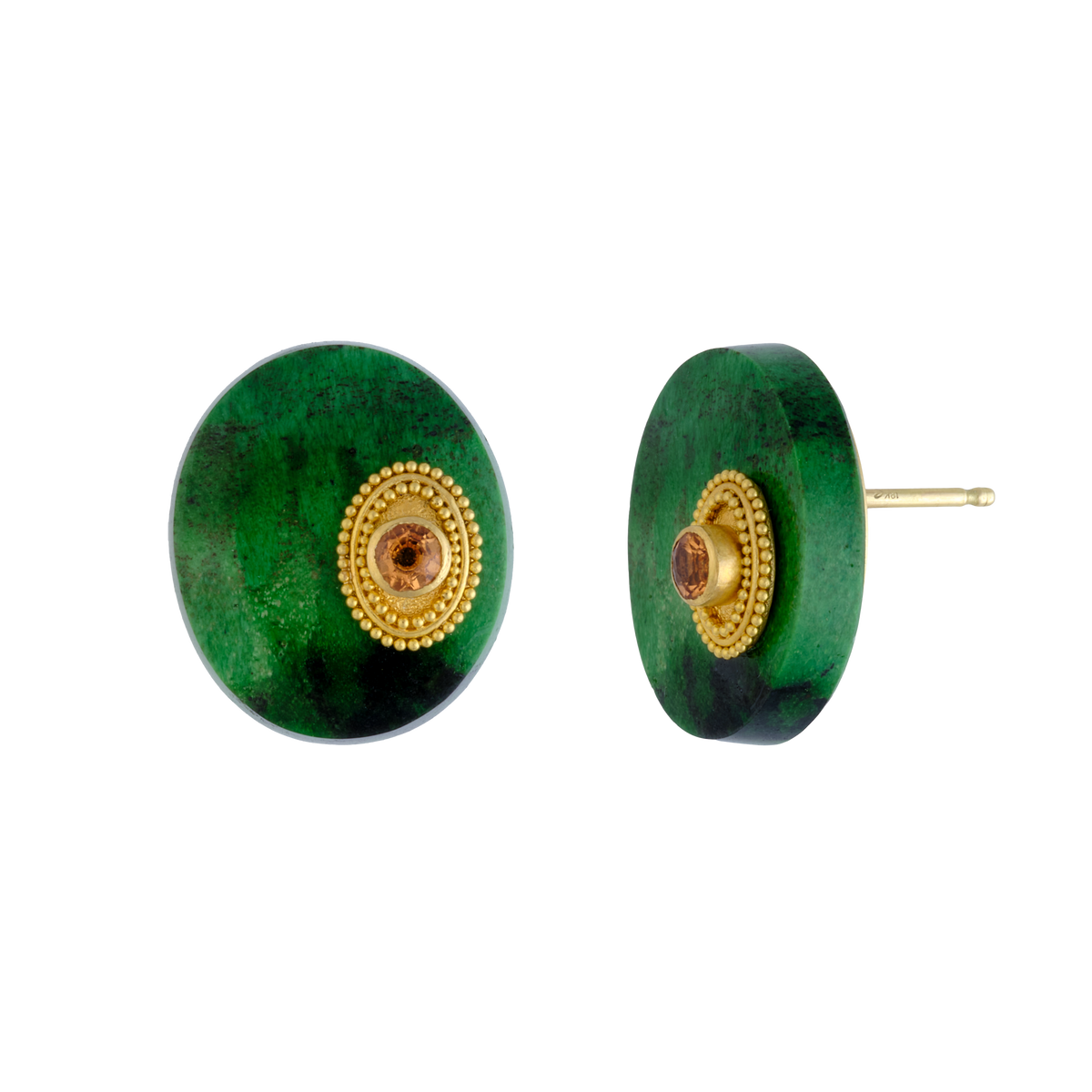 The beautiful vivid green and black oval tablet style cabochons in these stud earrings are grossular garnets from East Africa. Delicately granulated elliptical rondelles cradle egg yolk yellow sapphires, asymmetrically set on each garnet, providing an unexpected yet harmonious blend of ancient technique and modern design. Made from recycled 18k and 22k yellow gold, grossular garnets (29.5ctw) and Burmese spinel (.34ctw).

Two-of-two-of-a-kind.