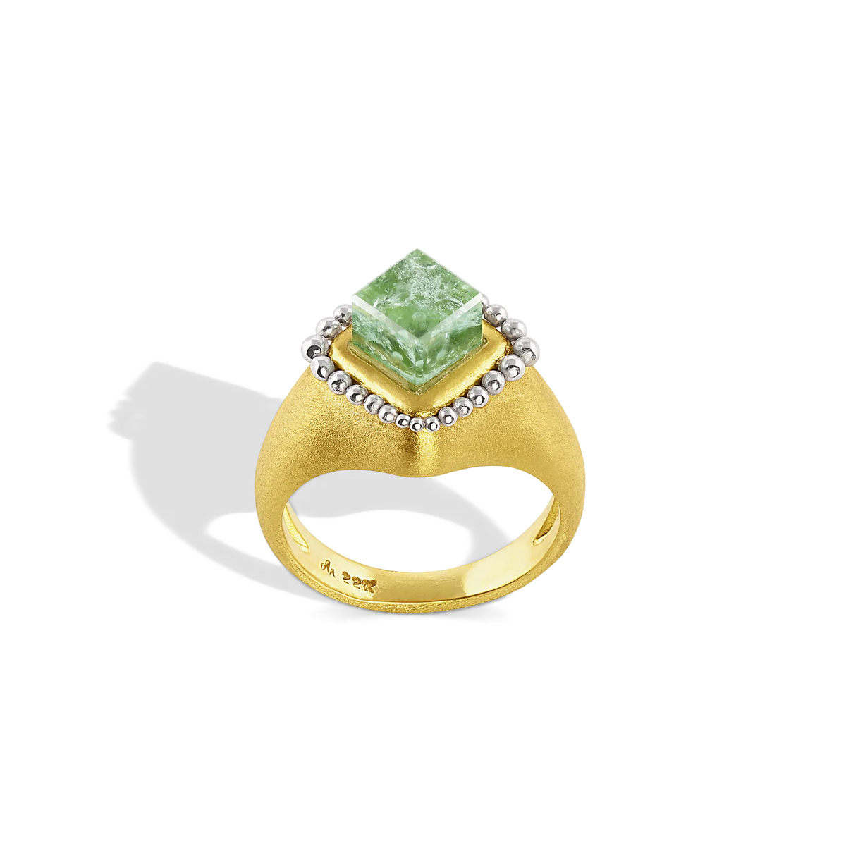 A fresh spring mint green tourmaline cube absolutely cried out to become a signet ring, and so it did! A halo of graduated polished platinum granulation floats around the edges. This ring is for everyone. Unisex.

Made in recycled 22k yellow gold and a Brazilian tourmaline (3.27ct). Size 7. Can be resized. One-of-a-kind.