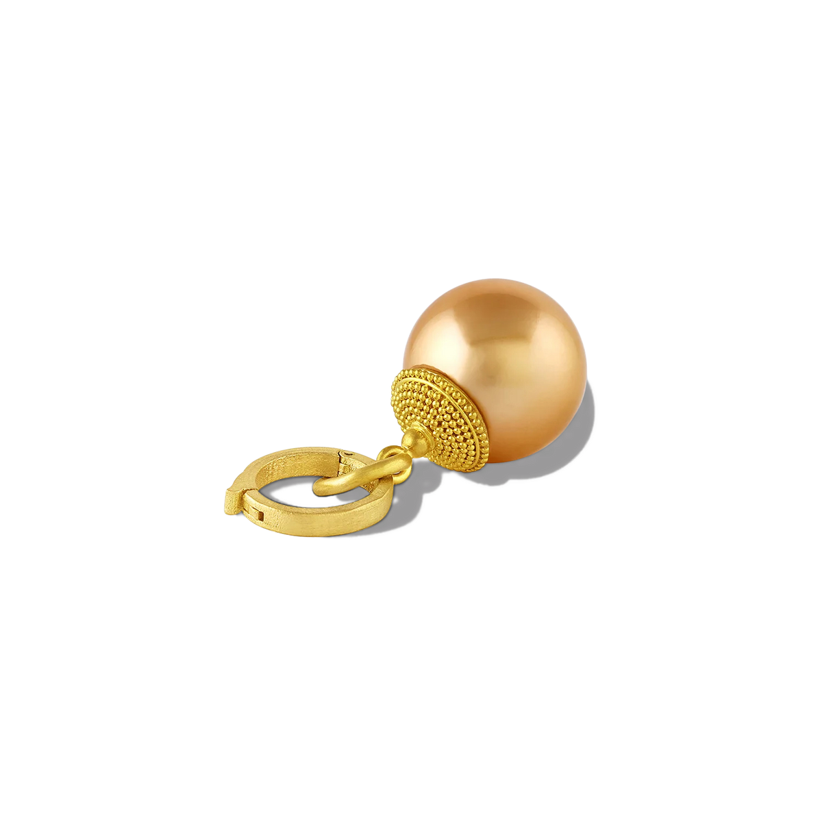 A rich, deep, glowing, golden South Sea Pearl is adorned with the soft silky tones of a golden granulated sun disk, blending the themes of golden spheres from the ocean with those from the earth. The 20K gold clasp is included. Length approximately 35mm, width 13.6mm (L 1.37in W .53in).

Made from recycled 22k and 20k gold and Philippine gold South Sea pearls. Chain is available separately.