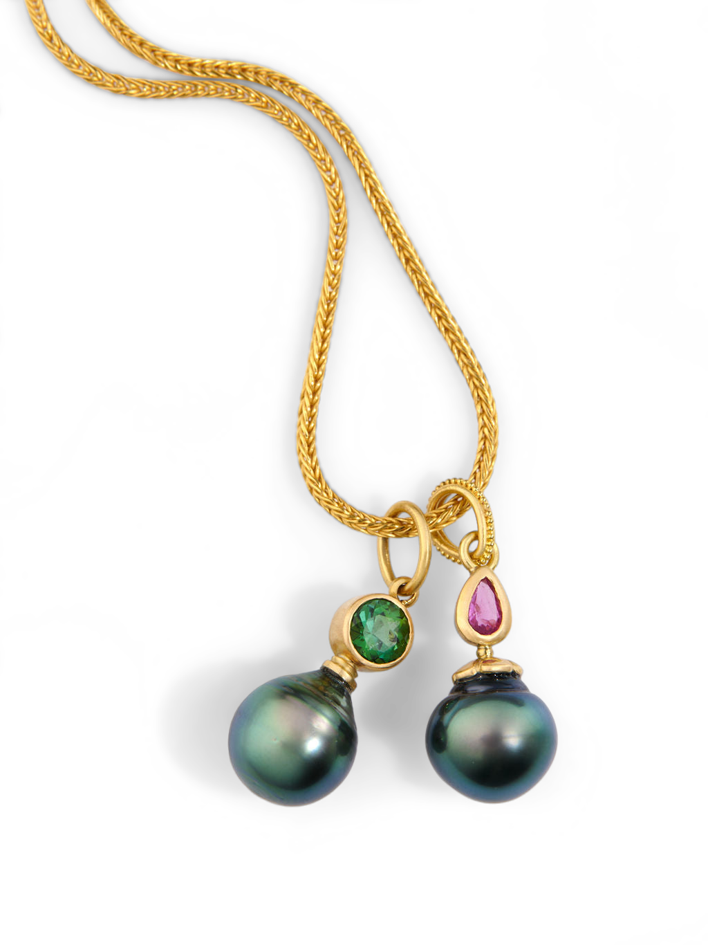 The Green charm and the Ruby Perfumer's Flask charm on a handwoven chain.