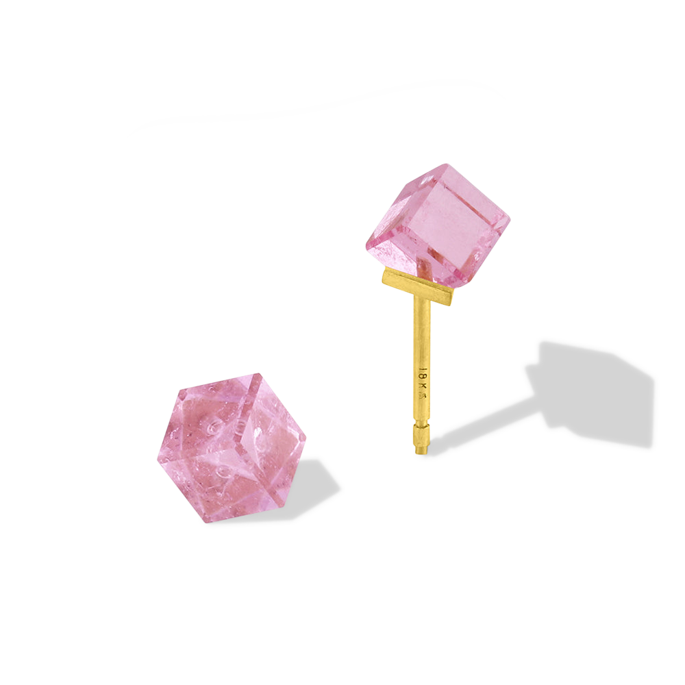 Mini tourmaline custom cut cubes are the perfect everyday pop of color. Discreet yet substantial enough to be noticed, these mini studs are striking and unique. We make these as we can find suitable cubes and as a result have only a very small number available. L 4.6mm W 4.6mm. Currently they are available in baby pink, deep pink and a bicolor mint green/baby pink.

Available as a single or pair, the listed price is for a single earring.

Made in recycled 22k yellow gold and pink tourmaline (2.64ctw).