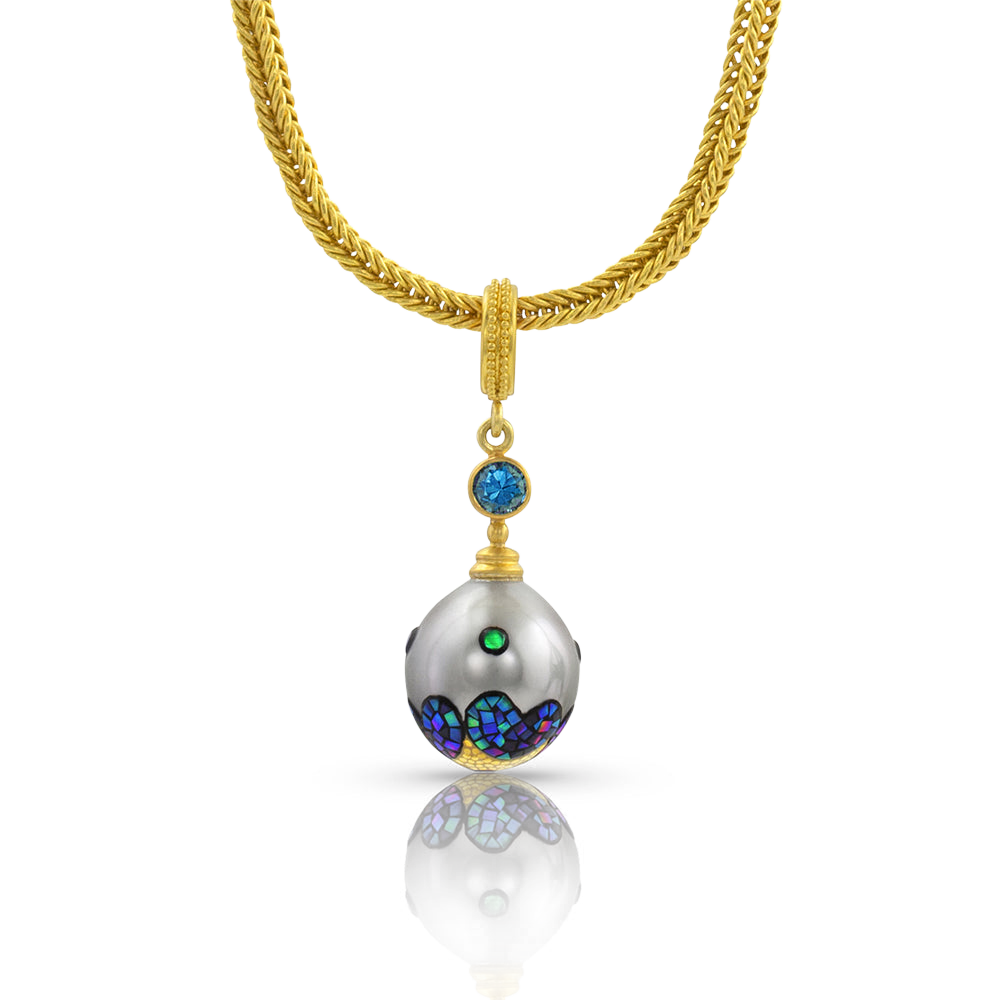 Mosaic Pearl charm shown on a handwoven gold chain.