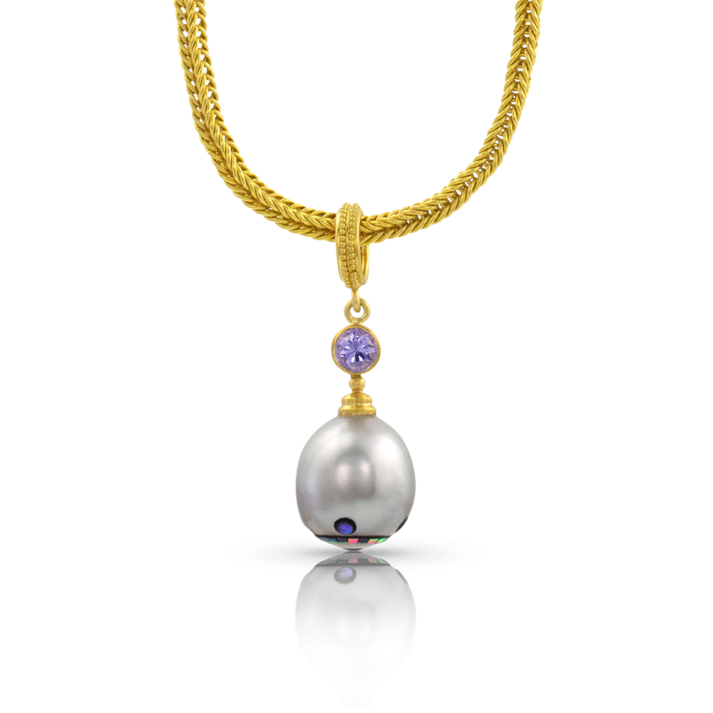 Mosaic Pearl charm shown on a handwoven gold chain.