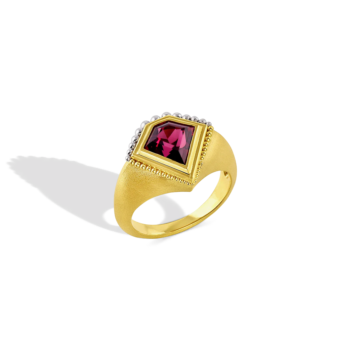 One-of-a-kind signet kite shaped ring featuring a rich and light filled Moyo Gems rhodolite garnet (1.19ct) with a beautiful deep pinkish purple glow. 

Made in recycled 22k yellow gold and platinum and a Kenyan garnet. Size 7.