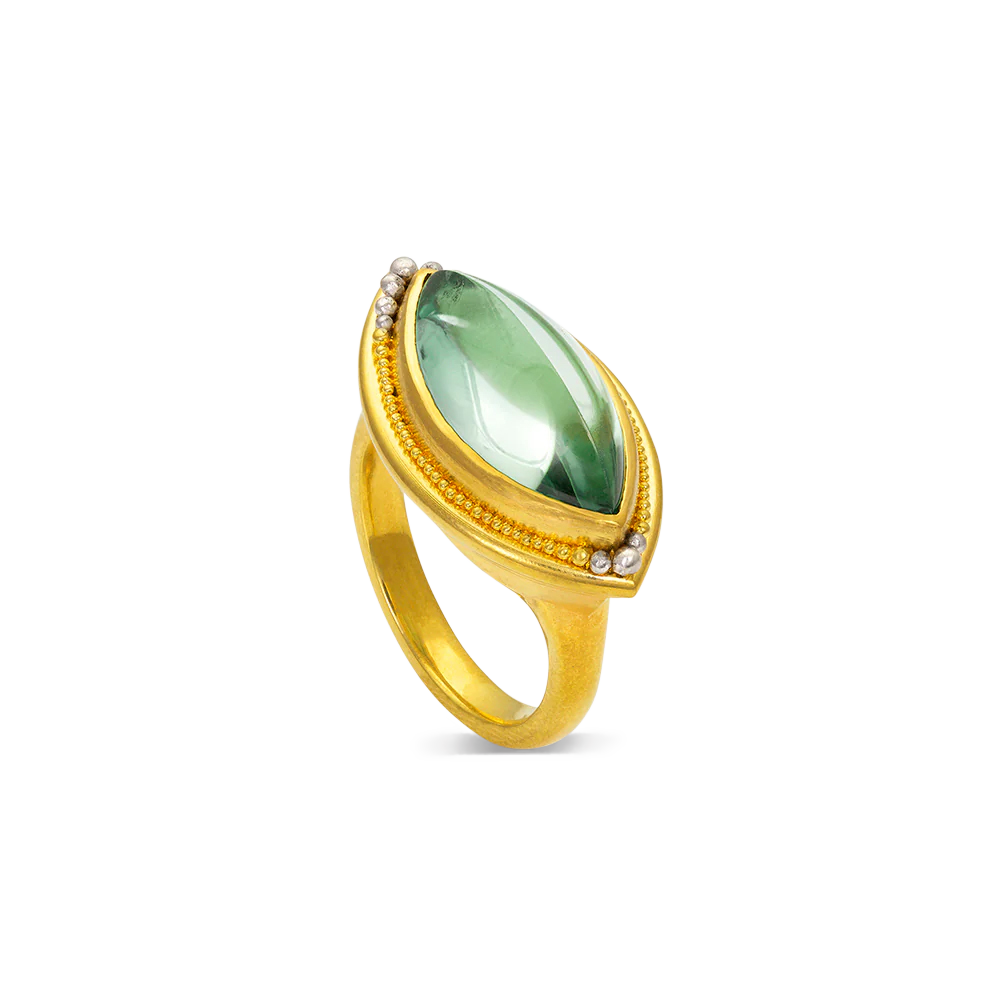 One-of-a-kind ring with an exceptional marquise shape bi-color green and white tourmaline and our signature graduated gold and platinum granulation. The polished platinum subtly highlights the darker green pointed ends of the stone, whilst the gold draws the eye to the color grading in the center.

Made in 22k yellow gold and platinum and a Nigerian tourmaline (6.77ctw). Size 7. Can be resized.