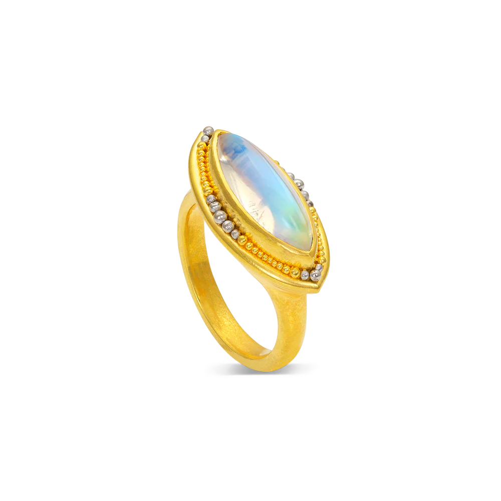 Lovely 16.5x6mm marquise rainbow moonstone surrounded our signature graduated gold and platinum granulation.

Made in 22k yellow gold and platinum and Tanzanian moonstone (3.23ctw). Size 7. Can be resized.

One-of-a-kind.