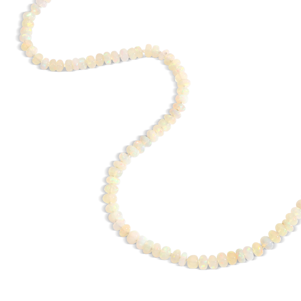 Softly glowing pastel opal roundel beads feature in this dainty necklace, each one hand knotted on silk and finished with our signature granulated Shepherd's hook clasp. 

Length 17 inches.

Made with recycled 22k yellow gold and white Ethiopian Welo opal beads. Knotted on silk.