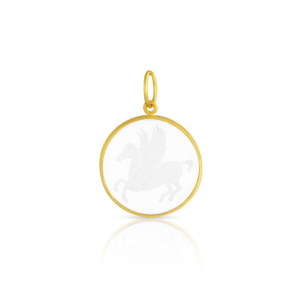 One-of-a-kind hand carved rock crystal charm depicting Pegasus the winged horse. This carving was inspired by the images struck on the famed Pegasus silver staters of Corinth. Legend tells us that Bellepheron, who became king of Corinth, tamed Pegasus with the help of a golden bridle given to him by Athena, hence Pegasus appears on many of the coins of Corinth. Made in recycled 22k yellow gold and Ataléia rock crystal from Brazil. L 30 mm W 21 mm (L 1.2 in W .8 in). 22k chain is available separately.