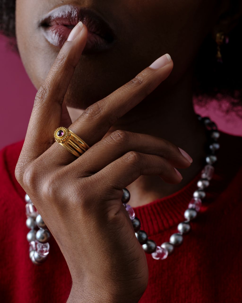 Model wearing the Fila Band and other rings.