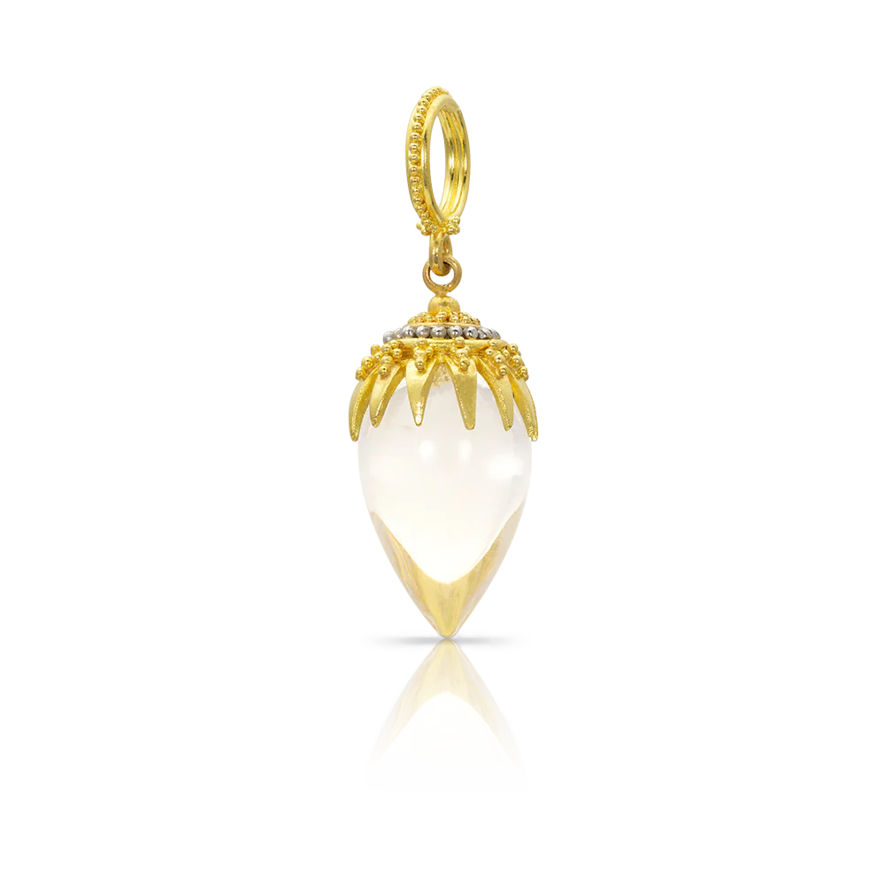 This beautiful charm is made from a rock crystal drop from Ataléia in Brazil, noted for the fineness and clarity of its stone, enhanced by our intricately granulated signature "spider" cap, featuring both gold and platinum granulation. Wear amulet style on a leather cord or on a favorite chain, with other charms and necklaces. W 11 X L 32 mm (W .43 X L 1.25 in). Also available in black onyx and black Tahitian pearl.

Handmade in recycled 22k gold and platinum and Brazilian rock crystal (9.98ctw).