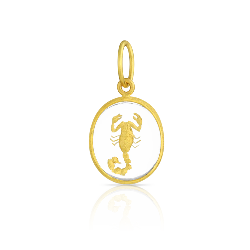 Hand carved and gilded rock crystal amulet charm depicting a scorpion inspired by the renowned Signet Ring of Horemheb, a Pharaoh of Egypt's 18th Dynasty. His solid gold signet ring is renown. It is especially known for the four-sided rectangular rotating bezel, one side engraved with a scorpion. The scorpion inspired the one depicted on this charm. Made in recycled 22k yellow gold and Ataléia rock crystal from Brazil. L 22 mm W 13 mm (L .87 in W .51 in). Chain is available separately.