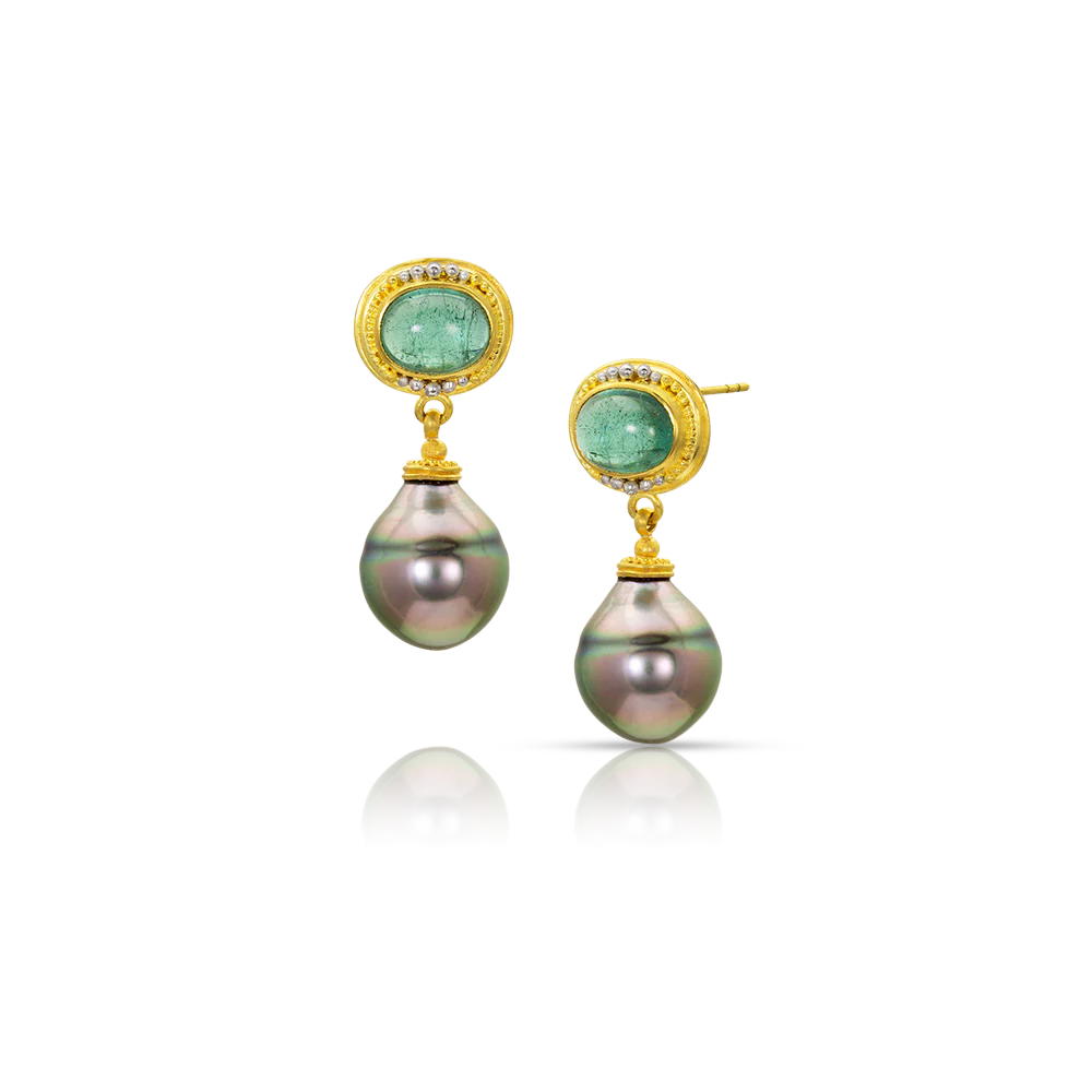 Silver pear shaped pearls with luscious green and pink overtones, topped with sea blue green tourmalines edged in our signature graduated gold and platinum granulation. Post and Guardian back.

Handmade from recycled 22k gold and platinum, Brazilian tourmaline (5.58ct) and cultured 12.1x13.8mm Tahitian pearls. Length approximately 30 mm or 1.18 in.

One-of-a-kind.