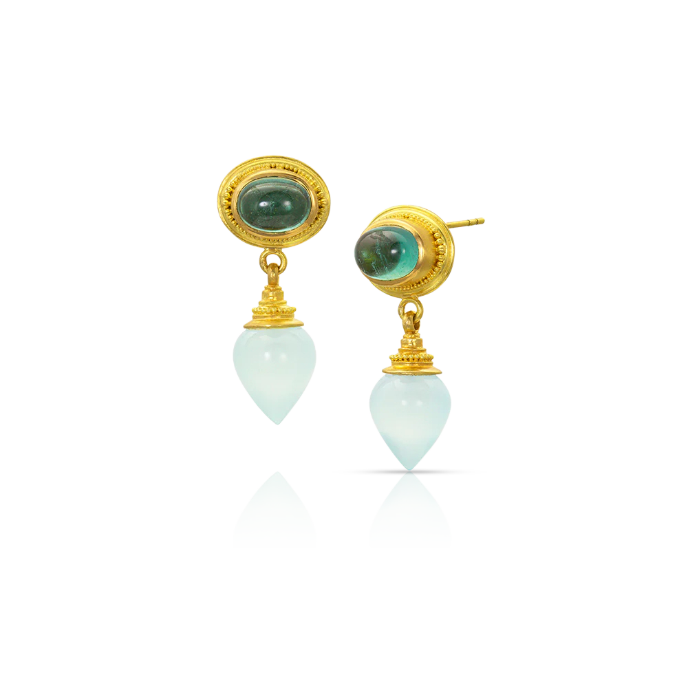 This amphora has intense seafoam tourmalines and delicate hand carved pale green agate set in warm, buttery gold. Our signature graduated granulation edges both the tourmalines and the agates, providing subtle details and a beautiful blend of ancient and modern. Wear with your favorite tee, a crisp button down or dress. 

Made from recycled gold, Brazilian tourmaline (3.15ct) and German (11.54ct) agate. Length approximately 29 mm or 1.14 in.

One-of-to-of-a-kind.