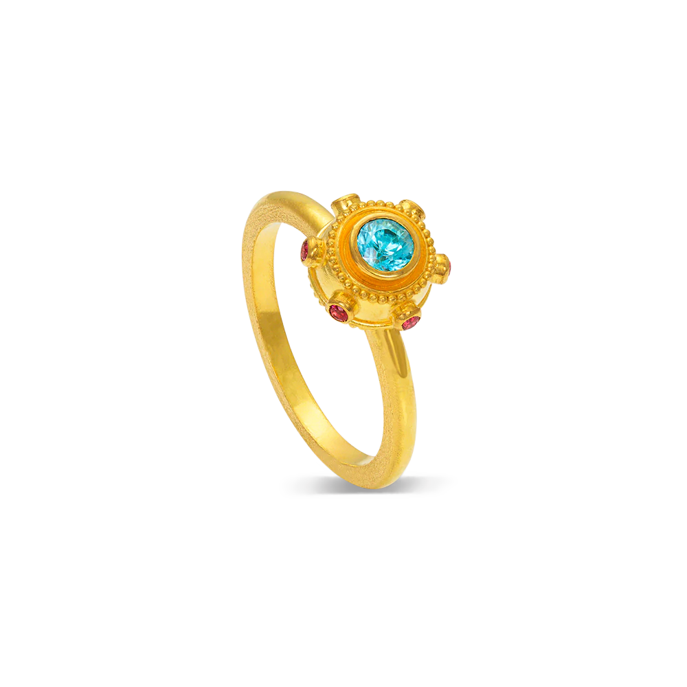Zircon is an underappreciated gemstone and this one sparkles. Surrounded by hot pink spinel and granulation, this bejeweled orb can be worn alone or create your own story by mixing with other Orb rings or your favorite stacking bands.

Made in recycled 22k yellow gold, Cambodian zircon (.42cts) and Burmese spinel (.14ctw). Size 7.5. Can be resized.