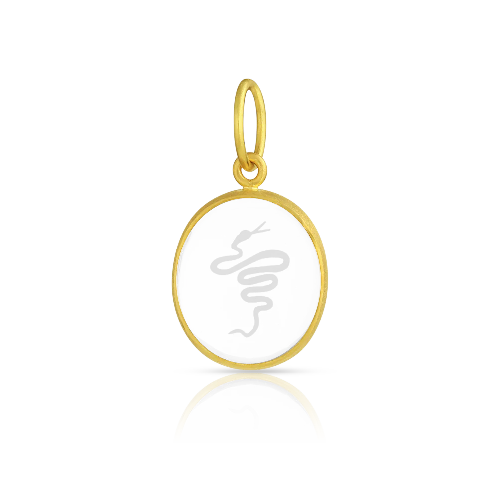 This dainty hand carved rock crystal amulet charm depicts a snake, in turn inspired by the crawling snake found on the reverse of an ancient Greek rock crystal scarab signet ring from the Archaic period 600-500 BC. The rock crystal comes from Ataléia in Brazil and is noted for its exceptional clarity. Made in recycled 22k yellow gold and hand carved rock crystal. L 22 mm W 13 mm (L .87 in W .51 in). Note that the chain is available separately.

One-of-a-kind.
