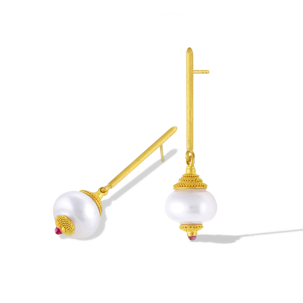 Golden pagoda style caps covered in tiny granulation perch atop circlé South Sea pearls. A curved cap sits below, with the same granulation flowing outwards from soft pink center set tourmalines. Long, elegant brushed golden sticks allow the pearls to swing gently from the ear, making these earrings unique and striking. Length approximately 46.5mm 12.8mm (L 1.8in W .5in). Made in recycled 22k yellow gold, 12mm Australian Paspaley South Sea pearls.