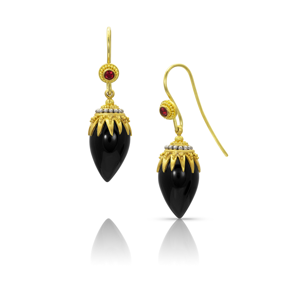 Hand carved tear shaped onyx drops are set with beautiful "spider" style granulated caps that gently swing from rich red spinel set French hook ear wires. Full of movement, these earrings display a tableau of minute granules in gold and polished platinum inspired by the craft and metalwork of the ancient Etruscans. Handmade from recycled 18 &amp; 22k gold and platinum, onyx (19.96ct) and Burmese spinel (.16ct). 18k yellow gold ear wire. Length approximately 37 mm or 1.46 in.

Made to order.
