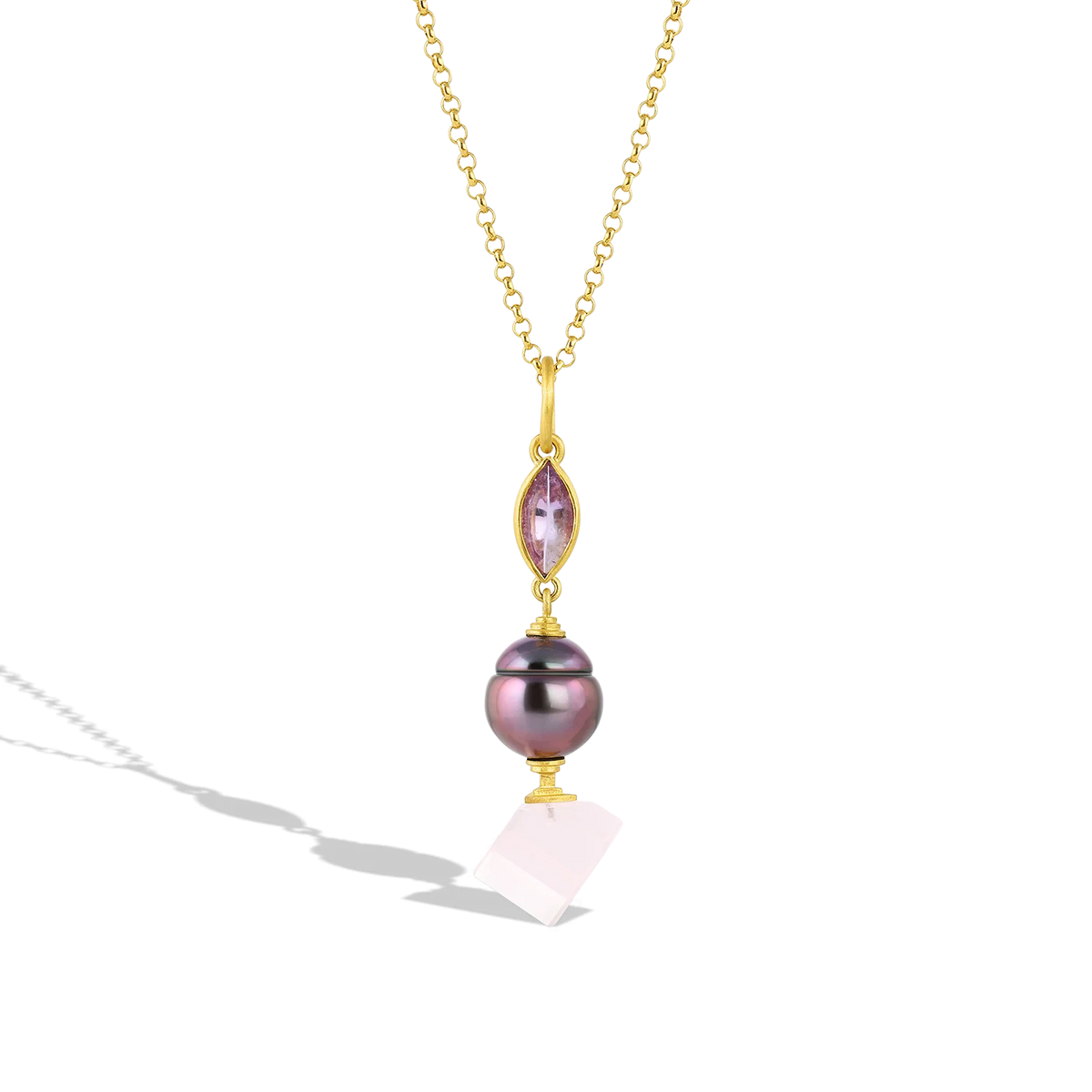 When I found this beautiful deep purple toned peacock Tahitian pearl, I sketched many designs before I decided on this one. I've never found this color again, making it special indeed. The mirror cut navette shaped violet amethyst and flawless rose quartz cube highlight all the purple tones in this one-of-a-kind peacock pearl. This charm is truly unique. Length approx. 58mm or 2.3in. Made from recycled 22k yellow gold, Brazilian amethyst (1.31ct, rose quartz (12.17ctw) and a cultured 12.3 x 13mm pearl.