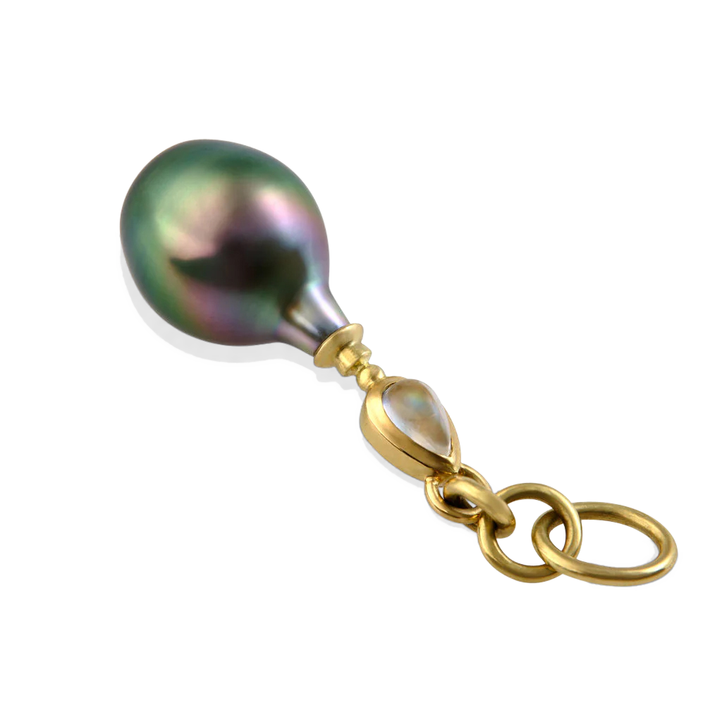 With its long, delicate neck, this silver pearl with the palest pastel pink and blue overtones simply had to join our growing collection of perfumer's flasks. A lovely pear-shaped rainbow moonstone made the perfect bejeweled top. This is a bit of a showstopper to wear as well, so bring out your favorite delicate chain! Length approx.  39mm, width 10.7mm (L 1.5in W .4in). Made from recycled 18k gold, a 15.7 x 10.7mm cultured Tahitian pearl and Tanzanian moonstone (.27ctw). Chain is available separately.