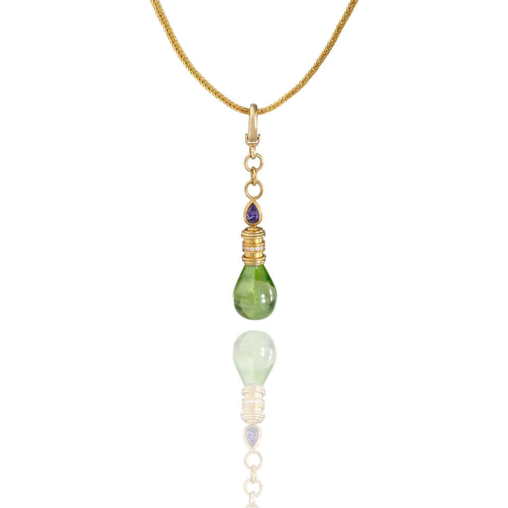The peridot Perfumer's flask shown on a handwoven chain. 