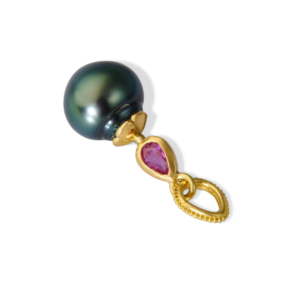 Angle view of the ruby Perfumer's Flask charm.
