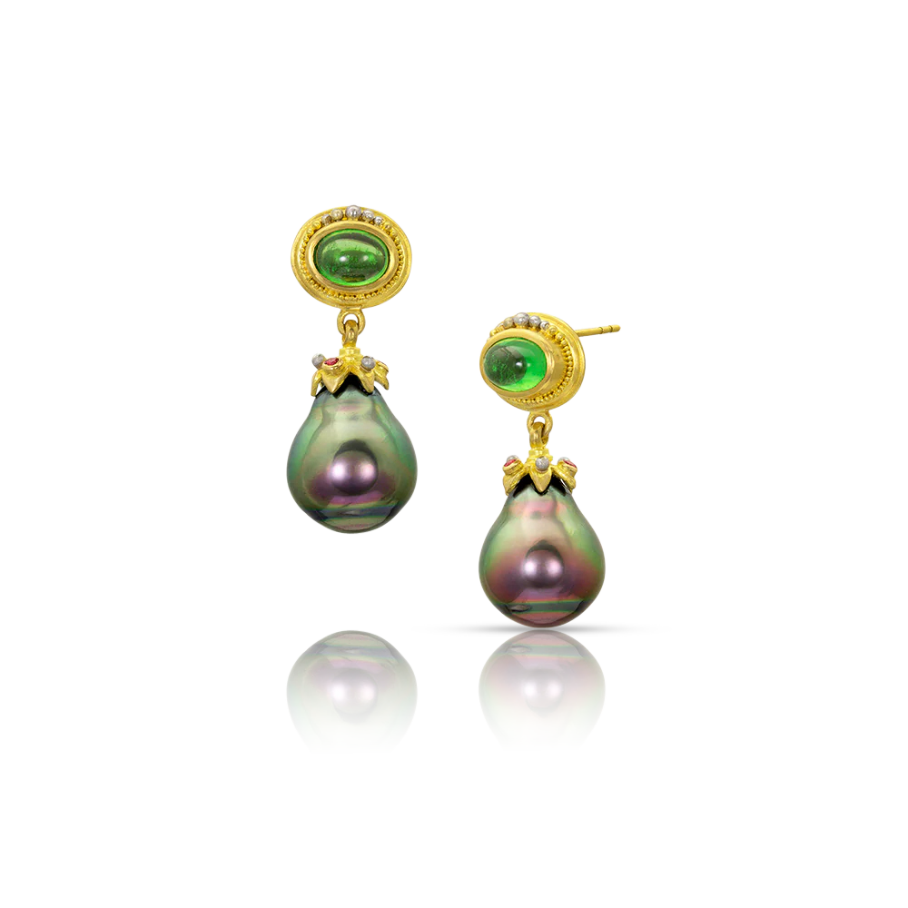 Intense peacock baroque pearls with vivid green and purple/pink overtones have star caps set with polished platinum granulation and deep pink spinel. These swing gently from rich green tsavorite garnets edged in our signature graduated gold and platinum granulation. Length approximately 30 mm or 1.18 in. 

Handmade from recycled 22k gold and platinum, tsavorite garnets (2.32ct Scorpion mine at Taita, Kenya), Burmese spinel (.11ct) and cultured 12.2x14.3mm Tahitian pearls.

One-of-a-kind.