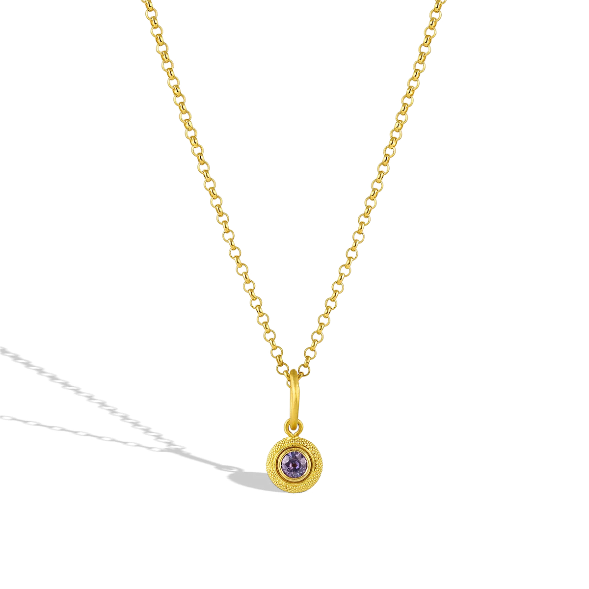 This charm has the silky appearance of a velvet cushion. The gold is smooth and almost soft to the touch, giving an almost hypnotic feel to the fingertips. The buttery tone of the gold is a perfect foil for the royal purple sapphire. Although the technique of granulation is ancient, the effect is modern, yet distinct. A charm for everyday wear. The chain is available separately. Handmade using recycled 22k gold and a purple sapphire (.45ct). Contact us at concierge@atelierwolff.com for your Velvet Cushion.