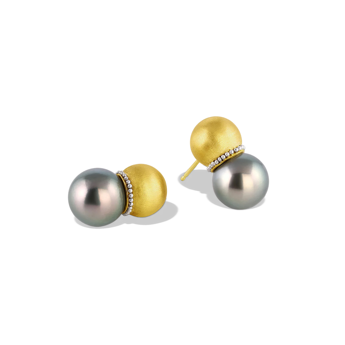 Hollow golden spheres edged with a delicate ruff of platinum granulation are set with lustrous round blue Tahitian pearls. These uniquely shaped and versatile earrings can be worn as ear climbers or as a drop, for climbers simply turn the pearls downwards. A pearl collector's choice for everyday wear. Length approximately 21mm W 12mm (L .8mm W .45in).

Made with recycled 22k yellow gold, platinum and cultured 12mm Tahitian pearls.