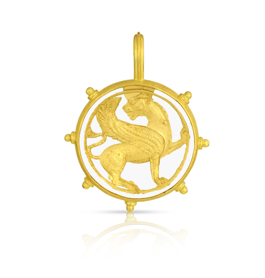 One-of-a kind carved and gilded rock crystal charm inspired by the Persian Achaemenid gold roundel of a winged lion now held at the Oriental Institute of the University of Chicago. Handmade using recycled 22k yellow gold and Ataléia rock crystal from Brazil.&nbsp;Chain is available separately.